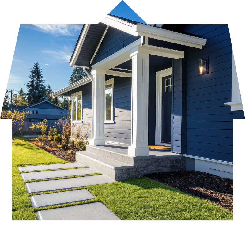 Elegant home entrance with white columns and vibrant blue siding, showcasing Bayside Builders Group’s expertise in Bay Area home remodeling and construction.